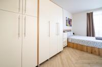 Postel nebo postele na pokoji v ubytování WOW studios for rent 2 bul Montevideo 25A - B