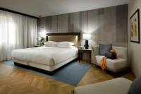 A bed or beds in a room at Hyatt Regency Hesperia Madrid