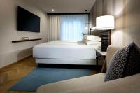 A bed or beds in a room at Hyatt Regency Hesperia Madrid