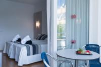 A bed or beds in a room at Sagitario Playa