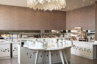 ラト ブティック ホテルにあるレストランまたは飲食店