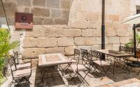 Un restaurante o sitio para comer en Hotel Ilunion Mérida Palace