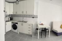 Kuchyň nebo kuchyňský kout v ubytování Apartamento con vistas al mar