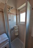 Kúpeľňa v ubytovaní Apartmani Marini