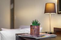 Postel nebo postele na pokoji v ubytování Hotel Alte Wache