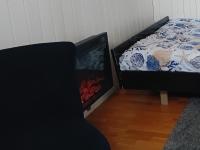 Een bed of bedden in een kamer bij APPART sur l&#39;EAU SPA Proche PARIS