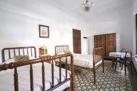Posteľ alebo postele v izbe v ubytovaní La Casa del Cura 1935