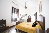 Posteľ alebo postele v izbe v ubytovaní La Casa del Cura 1935