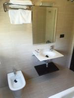 Koupelna v ubytování Hotel Millan