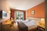 Ein Bett oder Betten in einem Zimmer der Unterkunft Remisens Hotel LUCIJA