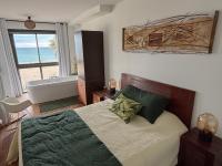 Ein Bett oder Betten in einem Zimmer der Unterkunft Entre ciel et mer, Le Murano un séjour de prestige