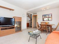 A television and/or entertainment centre at Apartment Aquaria-3 by Interhome
