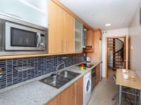 A kitchen or kitchenette at Apartment Aquaria-3 by Interhome