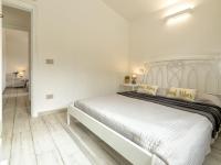 Łóżko lub łóżka w pokoju w obiekcie Villa Chicca by Interhome