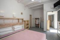 Postel nebo postele na pokoji v ubytování Hotel Irini