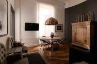Televízia a/alebo spoločenská miestnosť v ubytovaní Art Pantheon - Suites & Apartments