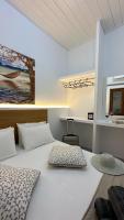 Postel nebo postele na pokoji v ubytování Del Sol Suites