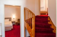 A bed or beds in a room at Gästehaus Brugger