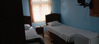 Postel nebo postele na pokoji v ubytování KARYA OTEL