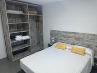 A bed or beds in a room at Agi Solimar Atico