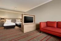 Ramada by Wyndham Amsterdam Airport Schipholにあるベッド