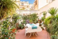 A garden outside At Kalsa Quiet Flowered Terrace! Free Parking! Ideal for remote working!