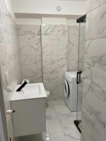 a bathroom with a toilet and a sink and a shower at Studio 50 m de la mer - Centre - Vue mer partielle in Nice