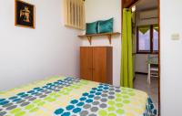 Posteľ alebo postele v izbe v ubytovaní Apartment Peroj Iii