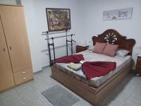 Postel nebo postele na pokoji v ubytování Vivienda Vacacional a 50 Metros de la Playa