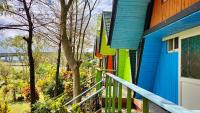 a colorful house with a colorful front porch at Kitefarm in Dongshan