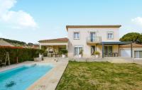 a villa with a swimming pool and a house at Beautiful Home In Sauveterre With Private Swimming Pool, Can Be Inside Or Outside in Sauveterre