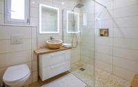 a bathroom with a sink and a toilet and a shower at Beautiful Home In Sauveterre With Private Swimming Pool, Can Be Inside Or Outside in Sauveterre