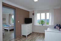 TV a/nebo společenská místnost v ubytování Apartments Michovka