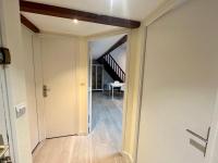 a hallway with a door leading into a room at Le 46 Magenta - Grand Duplex en hypercentre in Poitiers