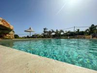 The swimming pool at or close to Splendida Villa NATURE- APPARTAMENTO ARANCIO a Scopello - Zingaro