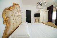 Postel nebo postele na pokoji v ubytování Villa Miramare
