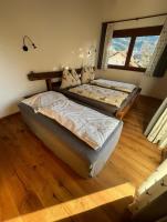 A bed or beds in a room at Ferienhaus Karlchen
