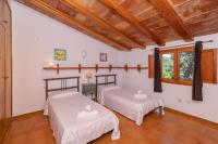 Postel nebo postele na pokoji v ubytování Villa Pi Tort by Sealand Villas