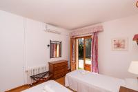 Postel nebo postele na pokoji v ubytování Villa Pi Tort by Sealand Villas