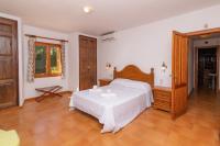 Postel nebo postele na pokoji v ubytování Villa Pi Tort by Sealand Villas
