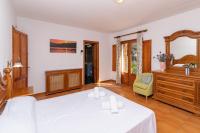 Postel nebo postele na pokoji v ubytování Villa Pi Tort by Sealand Villas