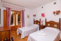 Postel nebo postele na pokoji v ubytování Villa Pi Tort by Sealand Villas