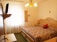 Posteľ alebo postele v izbe v ubytovaní Hotel Negritella