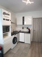 Kuchyňa alebo kuchynka v ubytovaní Foras Urban Living à 2 pas du festival