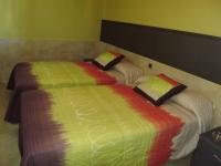 Posteľ alebo postele v izbe v ubytovaní Hotel Rural Las Palmeras Muskiz