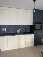 Kuchyň nebo kuchyňský kout v ubytování Polarstar Delux Apartment Nr 114 am Meer