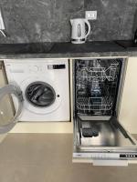 Kuchyň nebo kuchyňský kout v ubytování Polarstar Delux Apartment Nr 114 am Meer