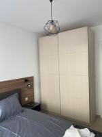 Postel nebo postele na pokoji v ubytování Polarstar Delux Apartment Nr 114 am Meer