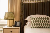 A bed or beds in a room at Vmaison Brera Milano