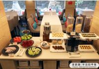 a table filled with different types of fruits and vegetables at The Gaia Hotel - Taipei in Taipei